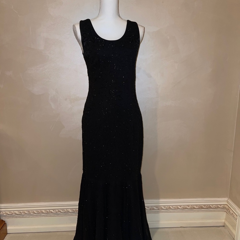 Black sleeveless gown